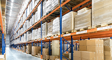 Goods on shelves in a large warehouse